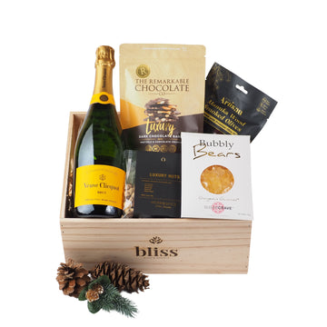 Veuve Clicquot Champagne completes this statement gift
Rich, elegant and undeniably indulgent, This Gift is crafted for moments that deserve to be truly celebrated.

Veuve Clicquot Champagne 750ml
the Remarkable Chocolate Co - Chocolate Bark - 125g 
 Luxury Nuts - 100g Kiwi 
Artisan Olives - 150g
Sugar Crave Bubbly Bears -100g