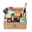 Pop the Prosecco and cue the carols - The bliss Christmas table gift crate is here to steal the show. This isn't just any Christmas hamper, its the ultimate festive feast in a beautifully presented wooden gift crate. Perfect for families, friends &amp; clients that deserve that extra special gift