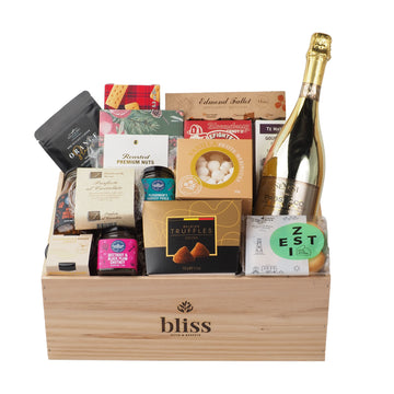 Pop the Prosecco and cue the carols - The bliss Christmas table gift crate is here to steal the show. This isn't just any Christmas hamper, its the ultimate festive feast in a beautifully presented wooden gift crate. Perfect for families, friends &amp; clients that deserve that extra special gift