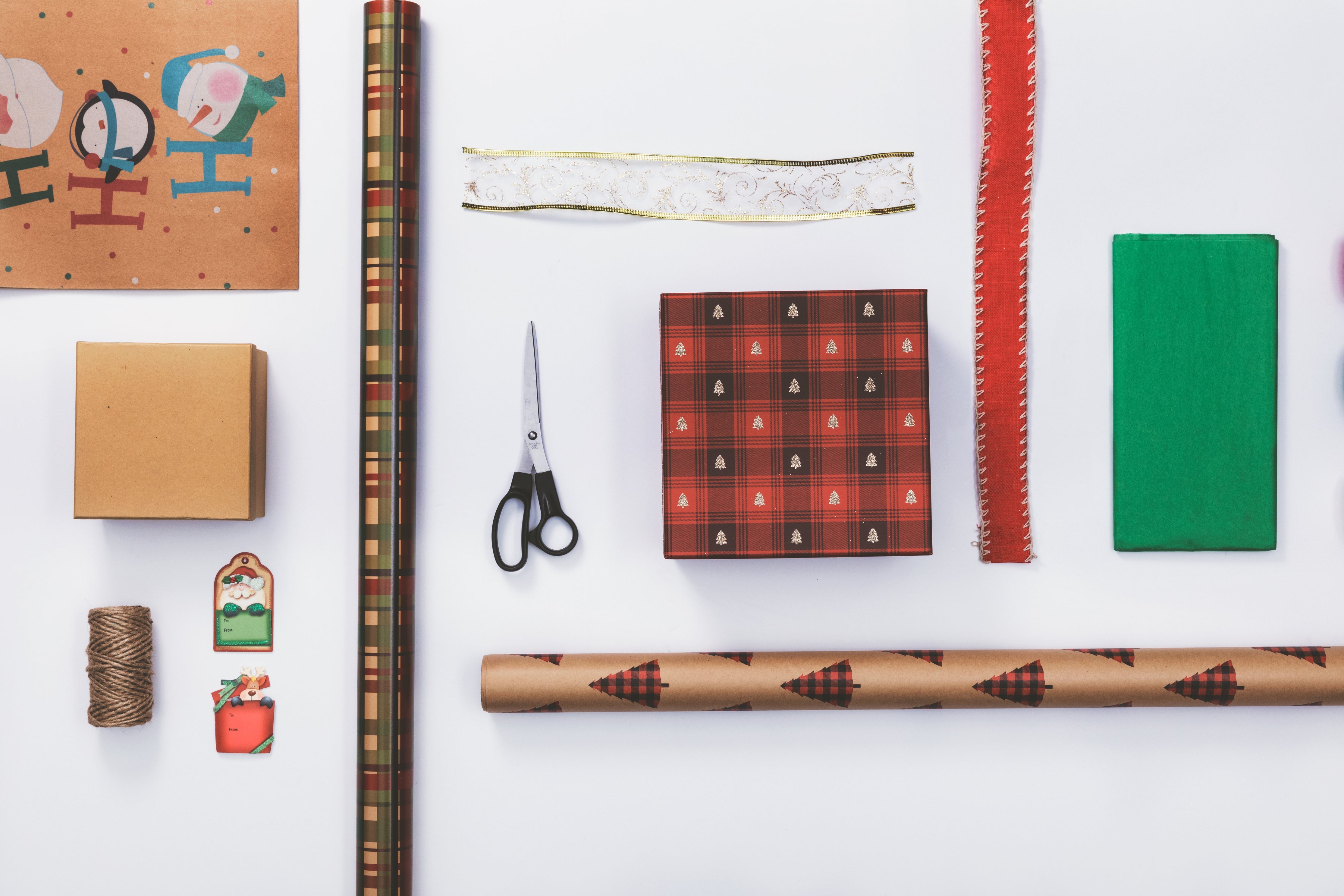 Holiday gift wrapping flatlay knolling