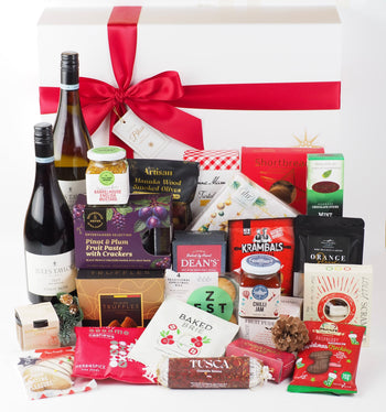 The Ultimate indulgence of the season-elegant, extravagant &amp; filled with festive cheer. Beautifully presented in a festive White Hamper with plush satin ribbon &amp; finished with a touch of bliss magic